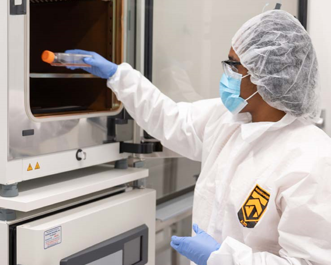 scientist doing research in lab clothes