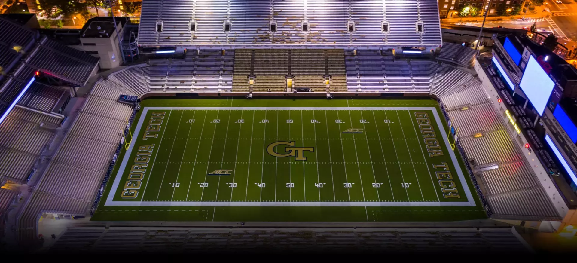 An overhead view of Bobby Dodd Stadium at Hyundai Field at night.
