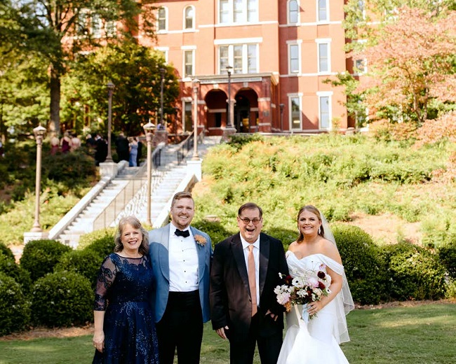 wedding photo of the Hawkins family in front of Tech Tower