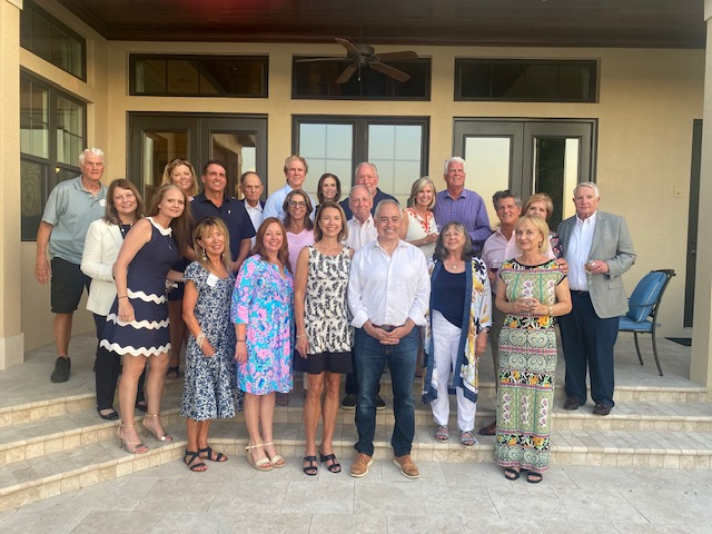 alumni and staff gathered with President Cabrera in Florida