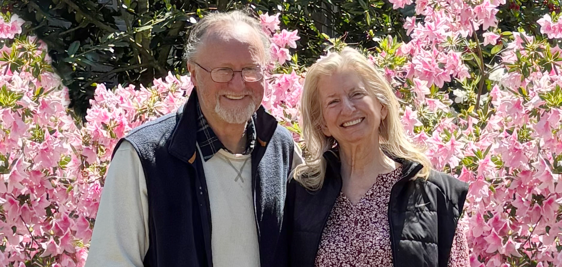 Southworth and Brown in front of flowers