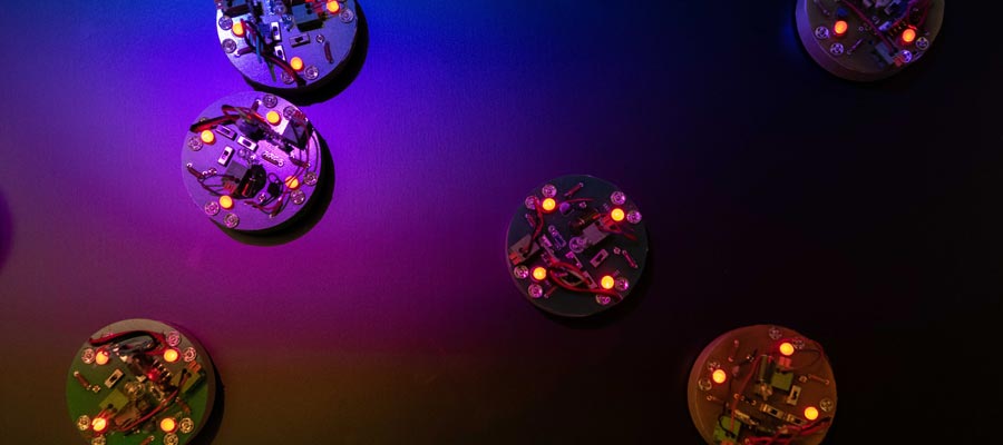 tiny robots with colorful lights