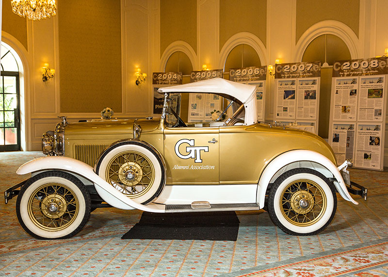 The Alumni Association Wreck parked in a ballroom